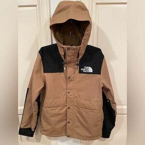 The North Face Medium Men’s Eco Mountain Jacet. one tiny spot on placard.
